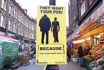 They want your pod! Police warn iPod and MP3 users on the streets of Brixton, London, Lambeth, London, 2007