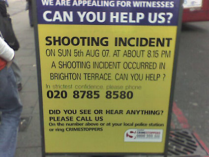Yellow police incident board. Shooting incident Brighton Terrace, Brixton, SW9, 8.15pm, Sunday 5th Aug 2007