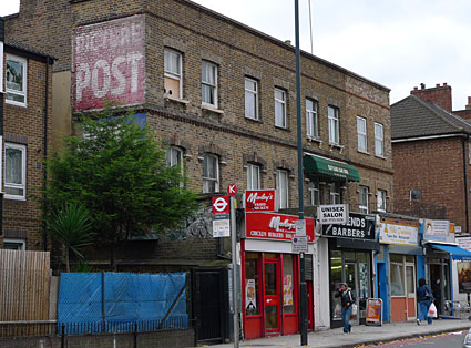 Street signs and advertising; a walk down Stockwell Road to Brixton, Lambeth, London SW9