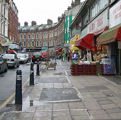 View of street market on Electric Avenue from Brixton railway station, December 2003