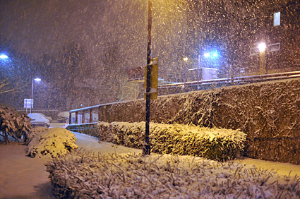 A snowy night in Brixton, Lambeth, London SW9 - scenes on Electric Avenue, Coldharbour Lane, Brixton Road, 2nd February 2009