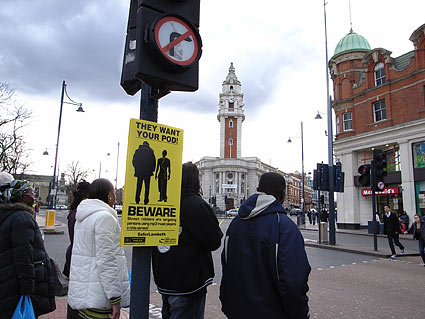 They want your pod! Police warn iPod and MP3 users on the streets of Brixton, London, Lambeth, London, 2007