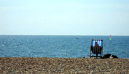 Sunbather, Brighton beach, East Sussex, England