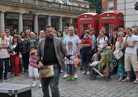Photos of Covent Garden market and street performers and buskers, Covent Garden, London WC2, London