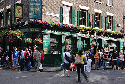 Late afternoon drinkers at the Market Porter pub, Borough Market, London, July 2007
