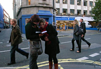 Looking for directions, Brewer Street, Soho, London