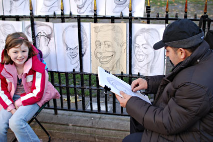 Street portrait artist, Leicester Square, London