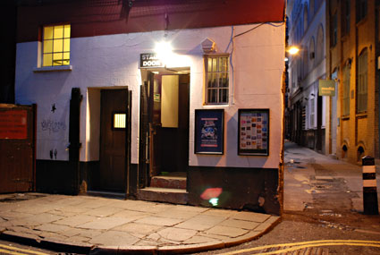 Stage Door at dusk, London
