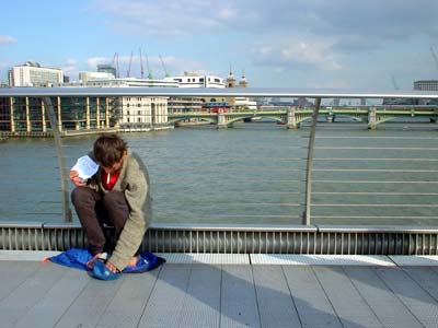 Millennium Bridge beggar, London