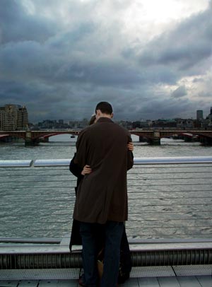 Couple snogging, Millennium Bridge, London
