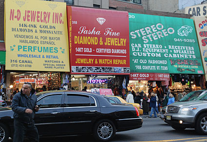 Canal Street shops and street traders, lower Manahattan, New York -  photographs and feature