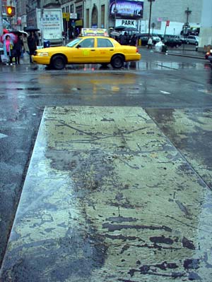 Taxi and metal plate, Canal Street, Chinatown, Manhattan, New York