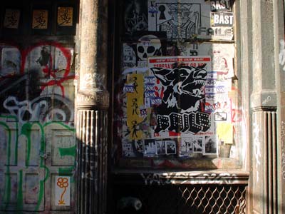 Iron columns and graffiti, Greene St, Manhattan, New York