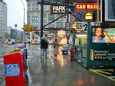 Rain, sign and subway entrance, East Houston Street, SoHo, Manhattan, New York