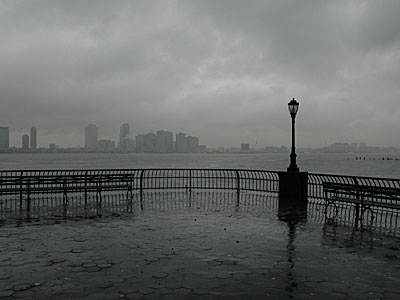 Empty park benches and rain, Lower Manhattan, New York, NYC, USA