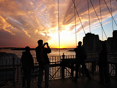 Photographers, sunset, Brooklyn Bridge, New York, USA