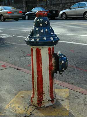 Stars and stripes fire hydrant, Washington Heights, Upper Manhattan, New York City, NYC, USA
