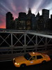 Yellow cab sunset, Brooklyn Bridge, New York, USA
