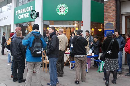 Space Hijackers protest outside the new Starbucks, Whitechapel High St, London, Sat 24th March 2007