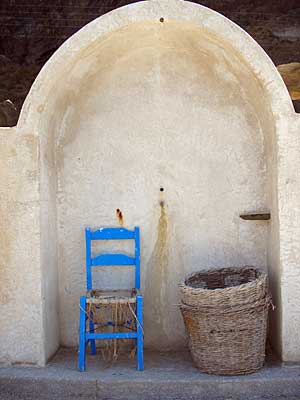 Chair and basket, Fira harbour, Santorini, Greece, September 2004