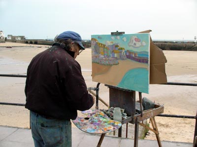 Artist, St Ives harbour, Cornwall, March 2003