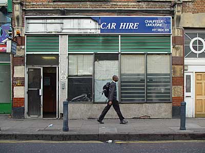 Home James taxi office, Coldharbour Lane, Brixton, Lambeth, London SW9, Nov 2003