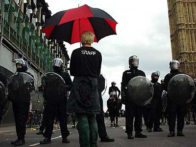 protester with umbrella, Westminster Bridge