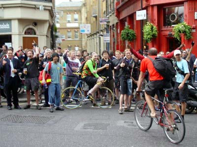 Cheers and handshakes, Duke of York, Clerkenwell Road, Critical mass bike ride, London, 27th June 2003